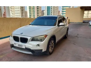 2013 BMW x1 في Dubai سيارة مستعملة