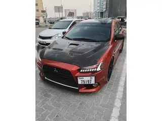 2009 Mitsubishi Evolution في Dubai سيارة مستعملة