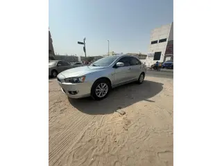 2016 Mitsubishi Lancer في Dubai سيارة مستعملة